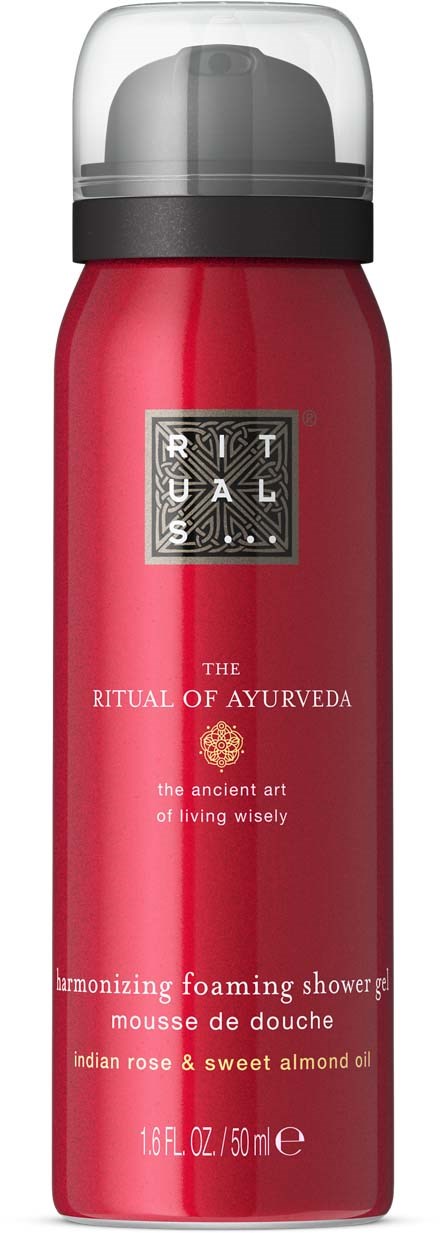 Red foaming shower gel bottle with black and silver cap, labeled 'RITUALS' and 'AYURVEDA' with floral design.