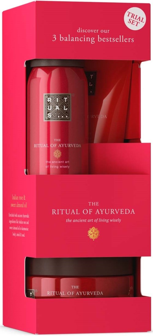 A skincare set in pink packaging with two bottles, labeled 'The Ritual of Ayurveda,' promoting balance and wellness.