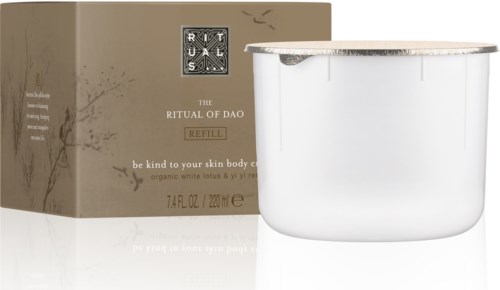 En hvit beholder med sølvdeksel ved siden av en beige boks med tekst om hudpleie og refill-alternativer.