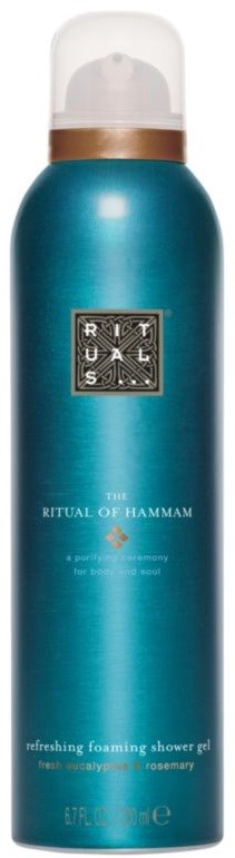 Blå showerfoamflaska med kopparfärgat lock, märkt 'The Ritual of Hammam' och 'friskgörande skumtvål.'