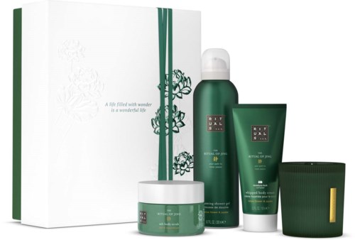 Set of green skincare products with white text, including spray, cream, and gel, in a box.