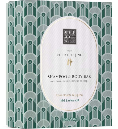 The packaging is decorated with a repeating geometric pattern in green and gray, with a central white oval label showing product information.