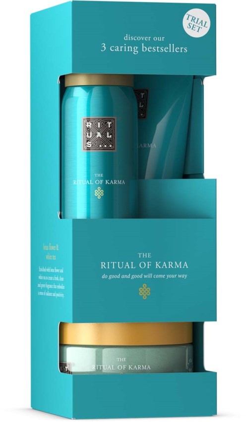 Een turquoise doos met twee potten erin, gelabeld 'The Ritual of Karma', promotend populairste bestsellers en een proefpakket.