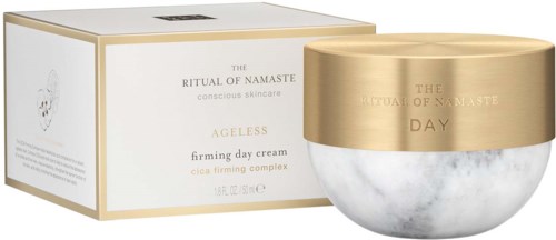 A skincare product labeled 'Ageless' in a gold and marble-designed jar with a matching box.