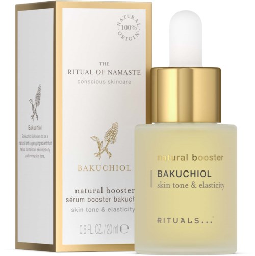 A skincare serum in a frosted bottle with a white dropper, gold cap, and a white and gold box beside it.