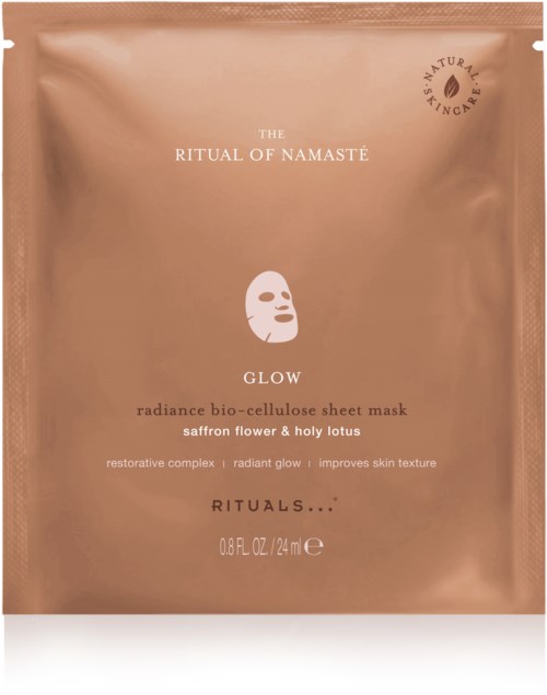 En rostguldig glansig påse märkt 'Glow' med en ansiktsmask samt beskrivning för hudföryngring. Restorerande och strålande.