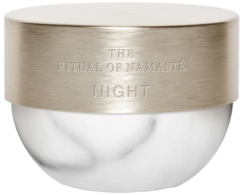 En rund behållare med metallisk topp och vit botten. Text på toppen: 'The Ritual of Namasté Night'.