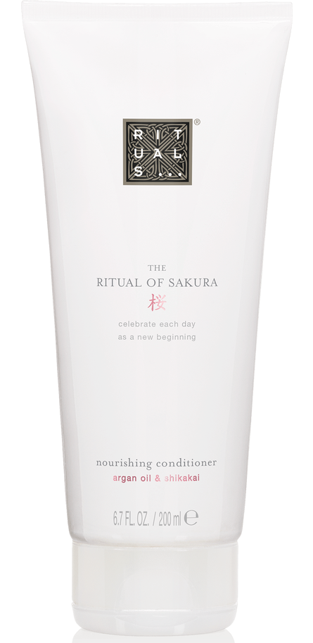 Hvitt tube-emballasje med svart og rosa tekst, merket 'The Ritual of Sakura' nærende balsam, 200 ml.
