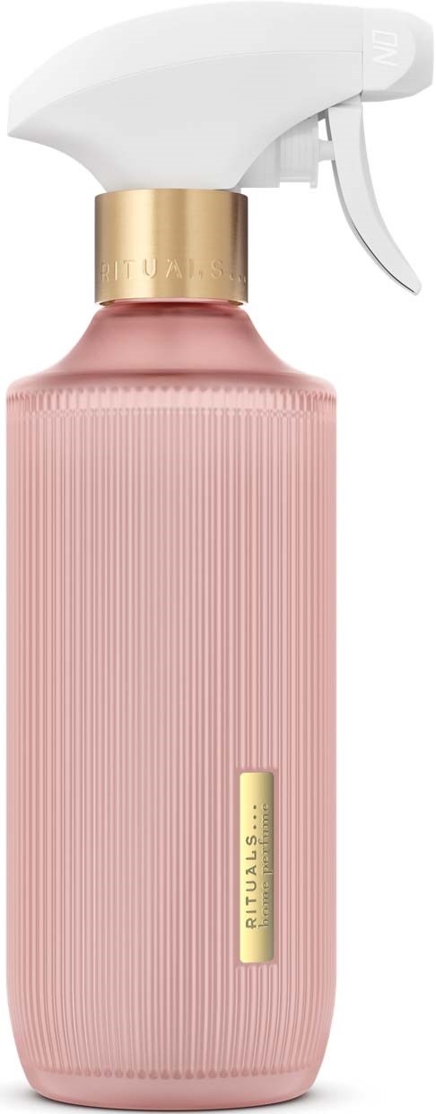 Rosa sprayflaske med hvitt sprayhode og gullfarge rundt toppen.