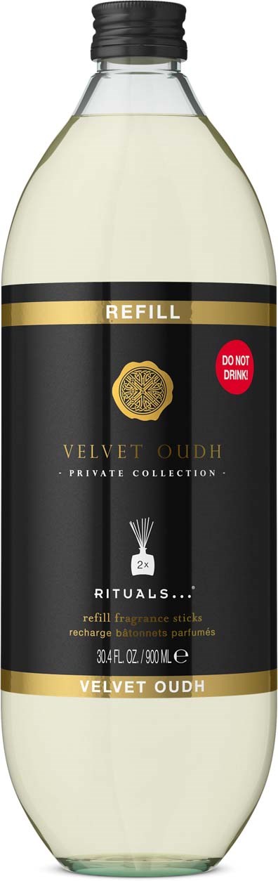 Butelka uzupełniająca Rituals Velvet Oud do powieszek z czarną i złotą etykietą i czerwoną naklejką ostrzegawczą.