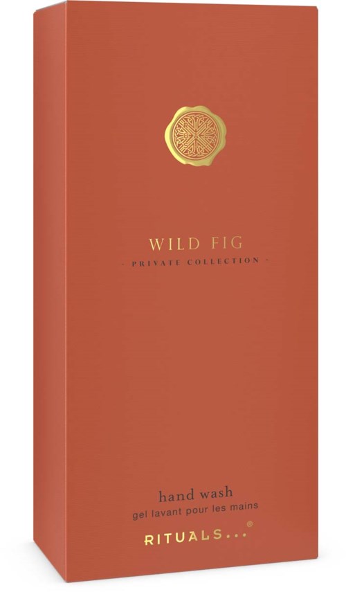 Wysoka, pomarańczowa opakowanie z złotym znakiem u góry i napisami Wild Fig mydło do rąk.