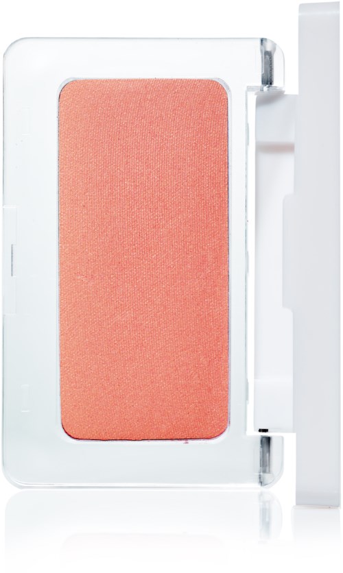 En peachfarget blush i et klart plastdeksel med hvit bakgrunn.