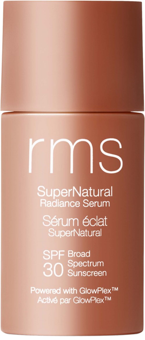 En flaska RMS SuperNatural Radiance Serum med SPF 30 i ett beige förpackning med samma lock.