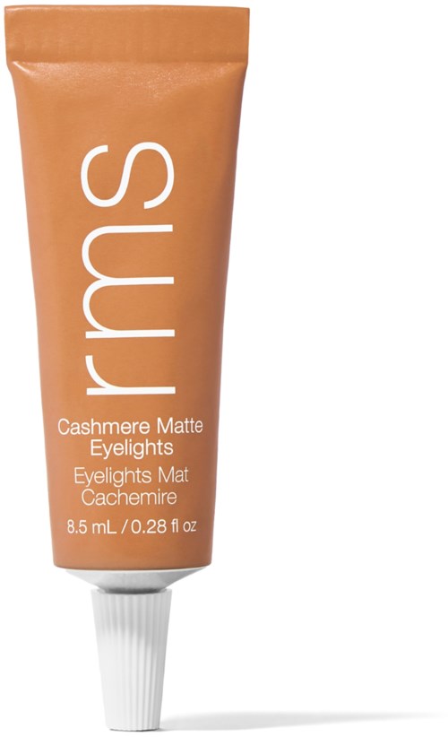A tube of cashmere-colored matte eyeshadows with white text showing product details and a white cap.