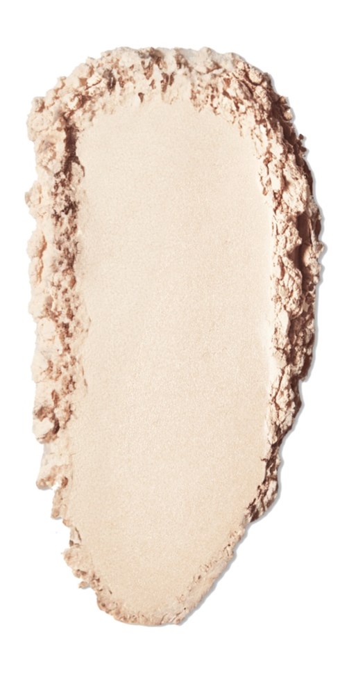 A torn, irregularly shaped piece of paper with rough edges and a smooth, cream-colored center.