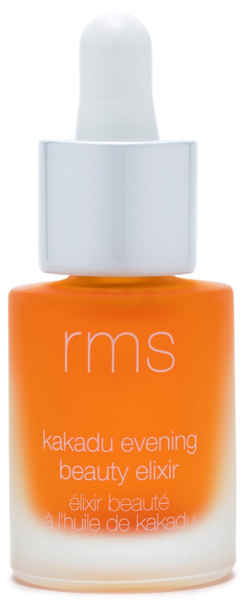 En liten orange flaske med en hvit dråpetetning, merket 'rms' og 'kakadu evening beauty elixir.'