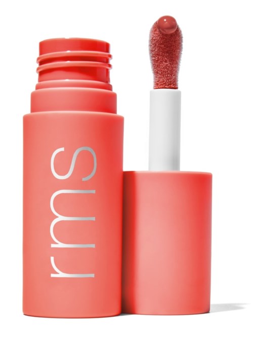 Een roze lippenstiftbusje met deksel eraf, toont de lippenstiftapplicator.