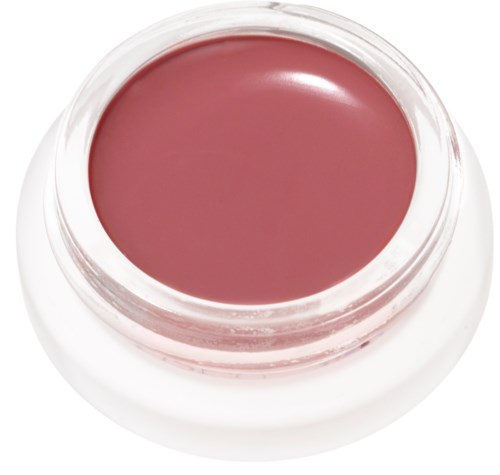 En liten burk med rosa läppbalsam eller kosmetikprodukt i en tydlig behållare.