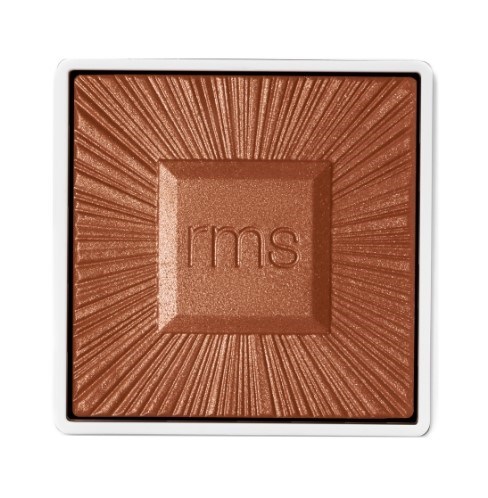 A square makeup blush with a shiny, textured surface and radiating lines pattern, labeled 'rms' in the center.