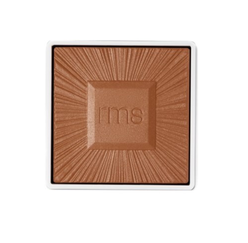 A makeup blush in a square container with a radiating sunburst pattern and the brand name 'ims' in the center.