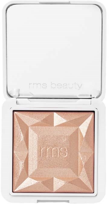 A makeup compact with a geometric pattern on the powder and a white case. The brand 'rms' is visible on the powder.