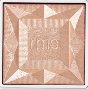 A beige pressed powder with a square shape and the letters 'rms' embossed in the center.