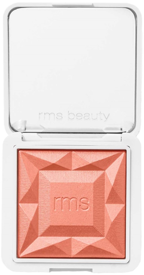 En fyrkantig makeup blush med ett geometriskt mönster och varumärket 'rms' på den inuti ett vitt fodral.