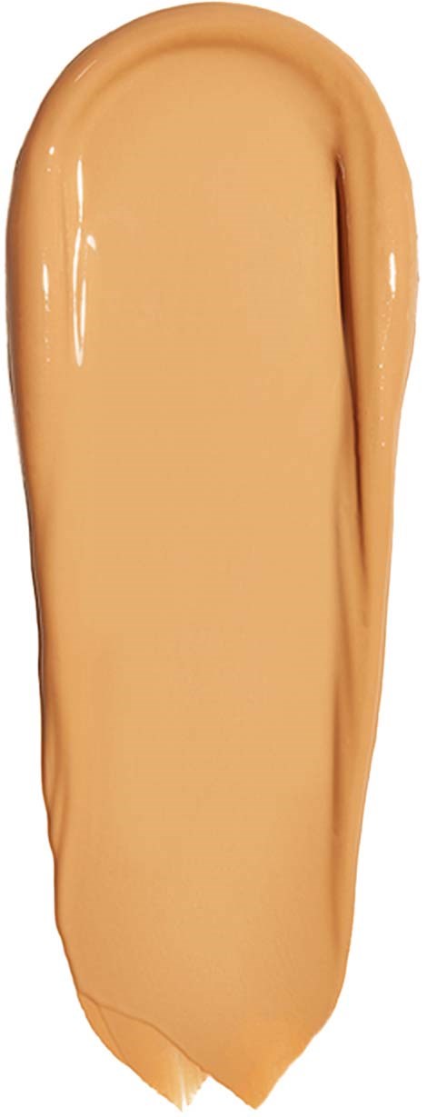 Een beige vloeibare foundationding met een gladde, glanzende textuur op een zwarte achtergrond.