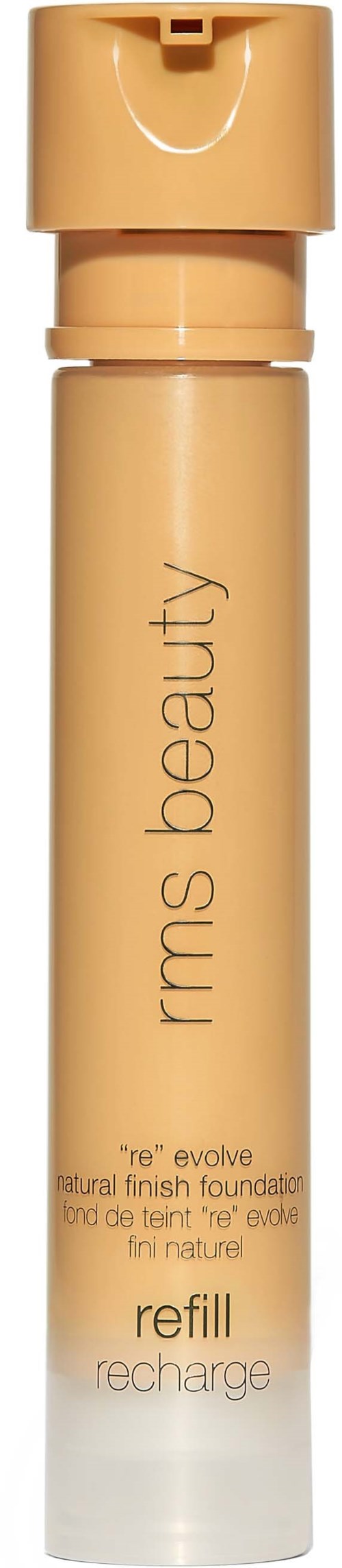 En beige flaska med pump, märkt 'kms beauty' och 'refill.' Den är för flytande foundation eller hudvård.