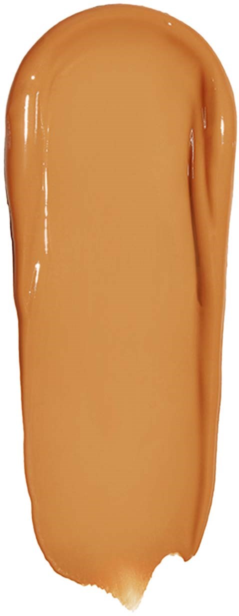 A beige liquid substance with a smooth, elongated shape and a small drip at the bottom.
