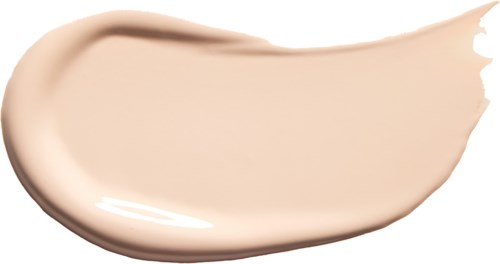 A cream or foundation swatch with a smooth, slightly curved shape on a black background.