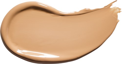 Creamy beige makeup foundation swatched with a brush, curved shape, smooth texture, on black background.