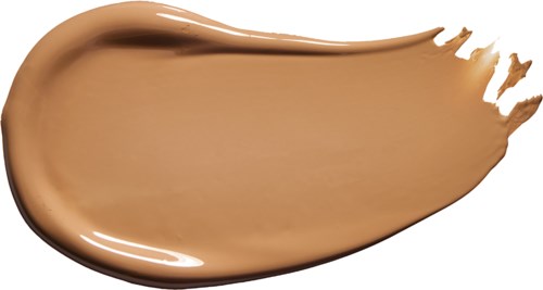 A beige liquid makeup smear with a smooth, creamy texture and uneven edges on the right side.