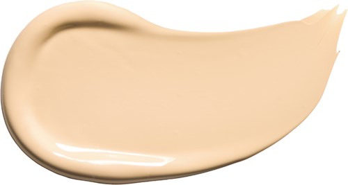 Cream or foundation swatch on black background, creamy texture, light beige color, rounded edge, glossy surface.