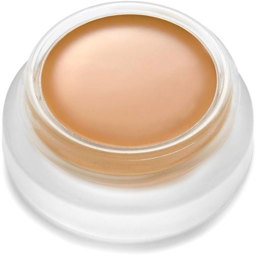 Creamy beige makeup in a jar, smooth and ready to use.