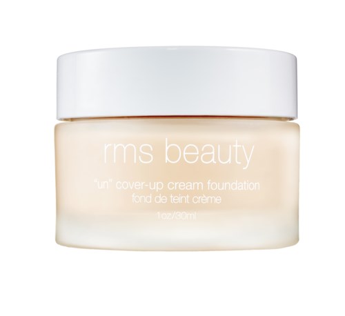 Słoik RMS Beauty 'Un' Cover-Up Cream Foundation z białą nakrętką i beżowym kremem w środku.