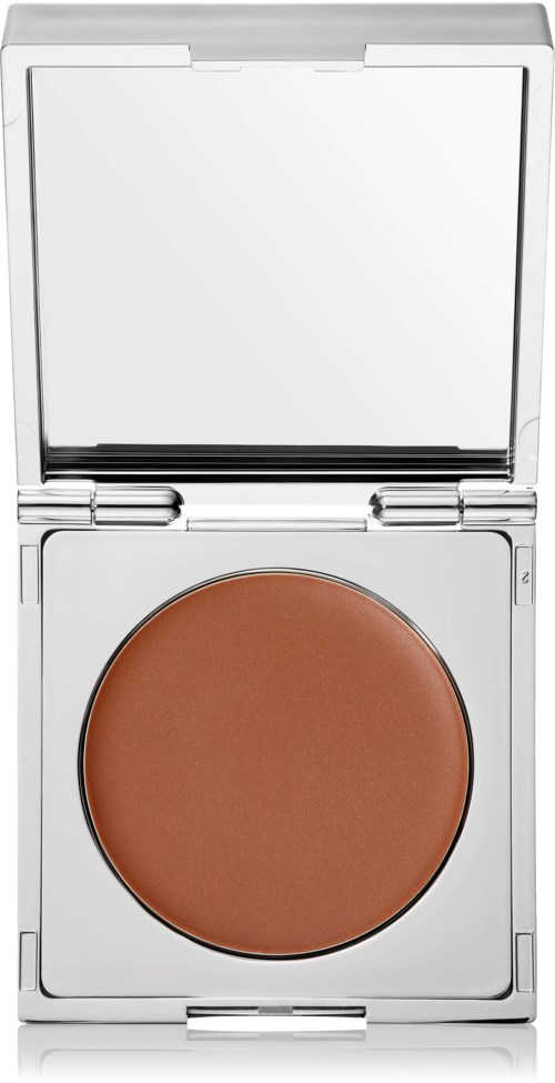 En lille makeupspejl med brunt rouge eller pudder.