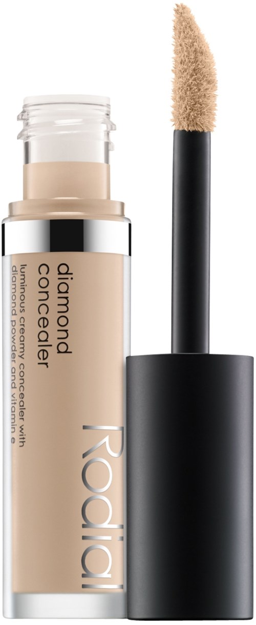 Et rør med flydende concealer og påføringspensel, mærket 'Rodia' og 'diamond concealer'.