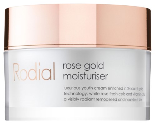 En hvid krukke med roséguldlåg, mærket 'Rodial rose gold moisturiser' til hudhydrering og ungdom.  