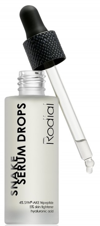 En hvid flaske med sort pipettehoved og en dråbe væske, mærket 'RODIAL' og 'SNAKE SERUM DROPS'.