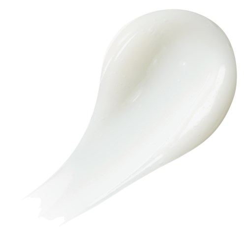 Een witte, gebogen substantie met een glanzend oppervlak, lijkt op een klodder crème of lotion.