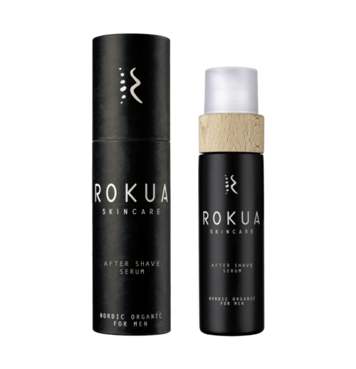 To hudplejeflasker, sorte og hvide, mærket 'After Shave Serum', lavet til mænds pleje.