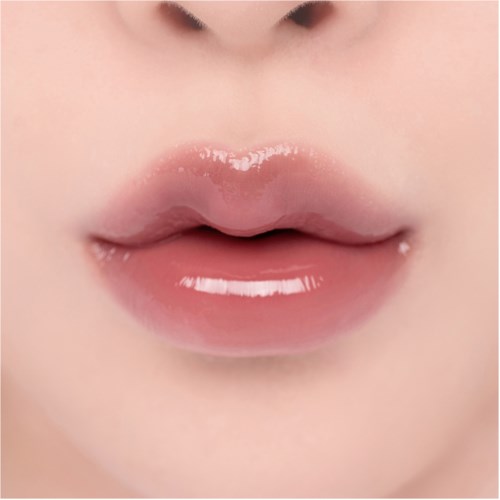 Close-up of lips with shiny gloss, showing full shape and smooth skin.