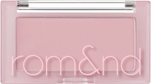 A pink flash drive or power bank with neon text reading 'rom&nd' on it.