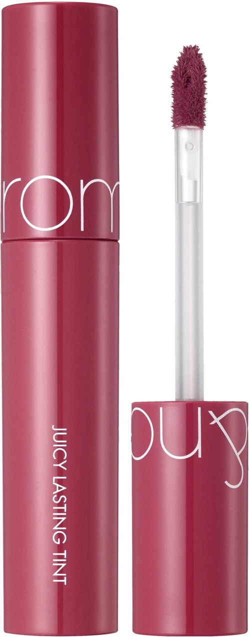 Lip gloss tube with a wand, pink color, labeled Juicy Lasting Tint, placed upright.