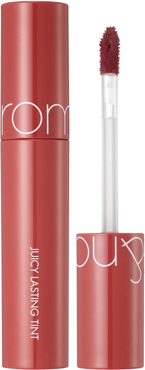 A pink lip gloss tube with a wand applicator showing, labeled 'Juicy Lasting Tint.'