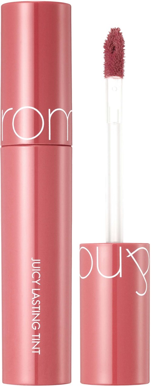 Pink tube with white text and a matching pink cap. The cap is removed, revealing a doe-foot applicator with lipstick.