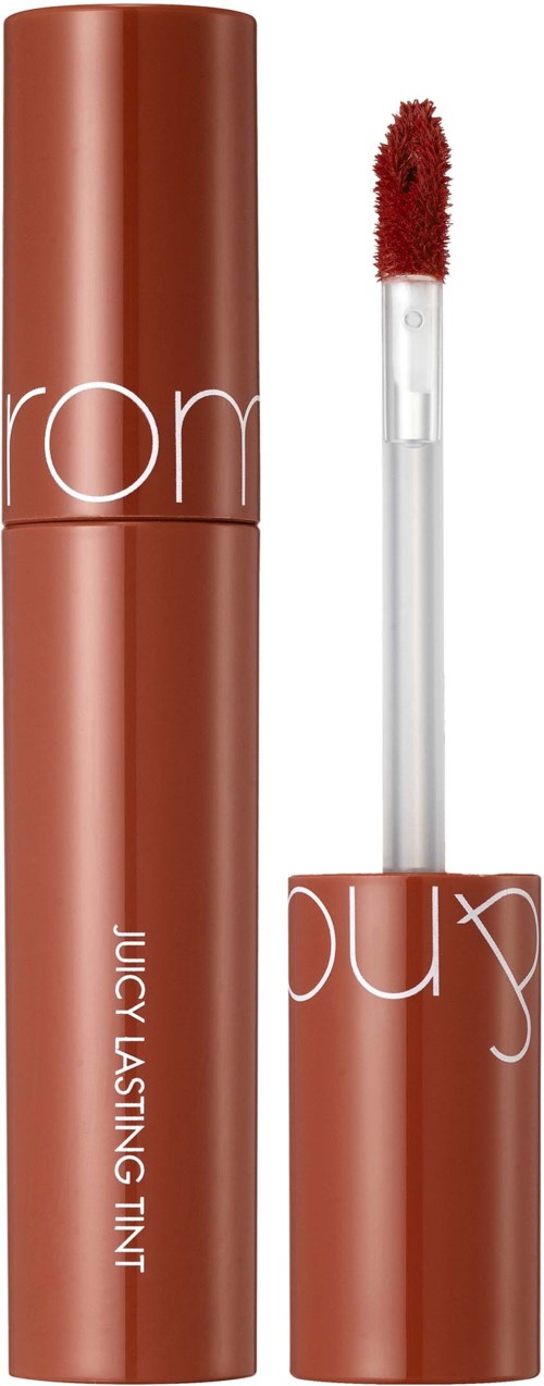 A brown tube with a wand showing red lip gloss, branded with "rom" and "JUICY LASTING TINT".