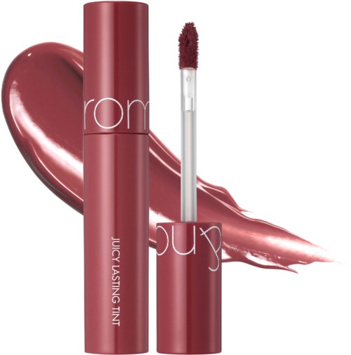 Lippenbalsem tube met applicator, mauve kleur, grote lippenstiftafdruk op de achtergrond.