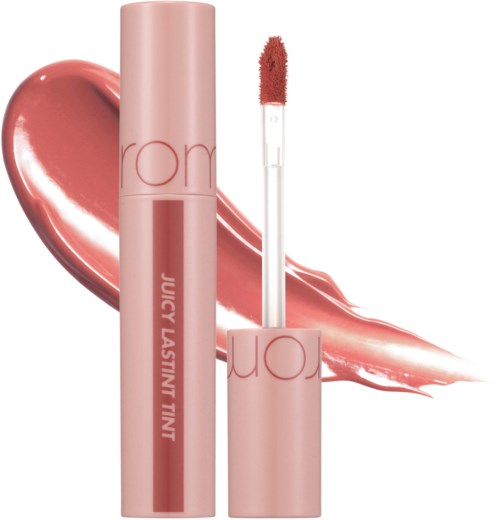 Lip gloss tube with a brush, pink color with red lettering, and a shiny lip gloss smear background.